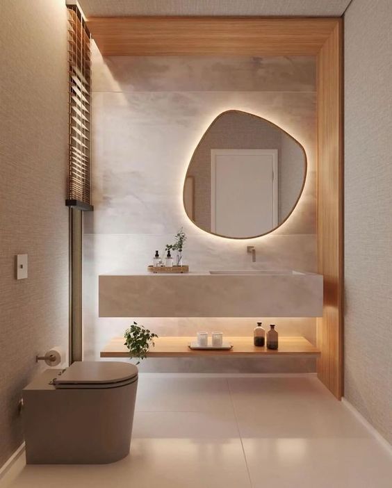 Banheiro Moderno e minimalista com luzes indiretas em tons quentes 